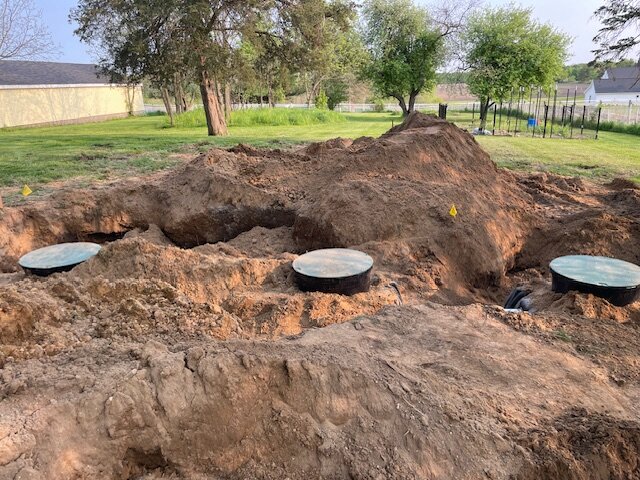 Multiple septic tank access lids during installation